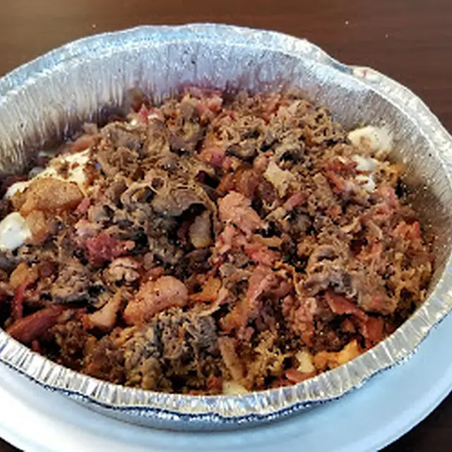 Baked pasta with meat in a foil tray