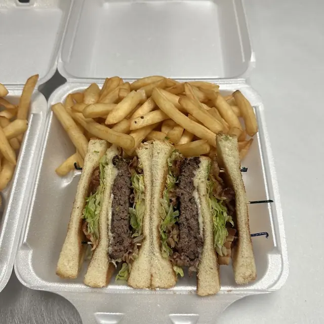 Steak and cheese subs with a side of fries